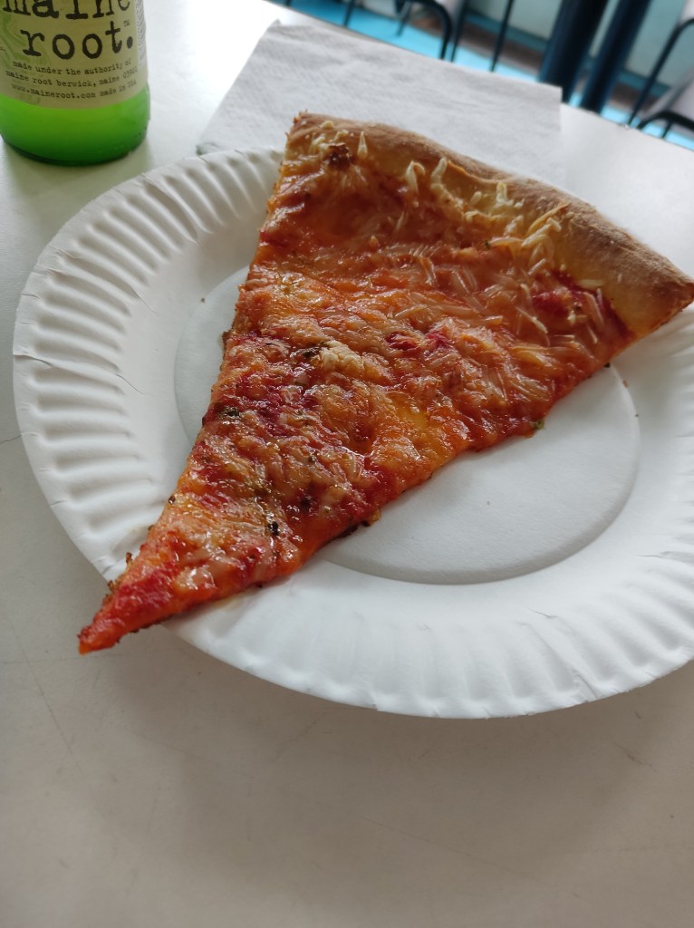 A slice of margherita pizza