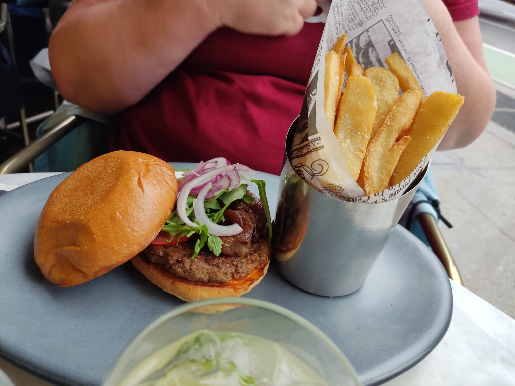 A burger and portion of chips