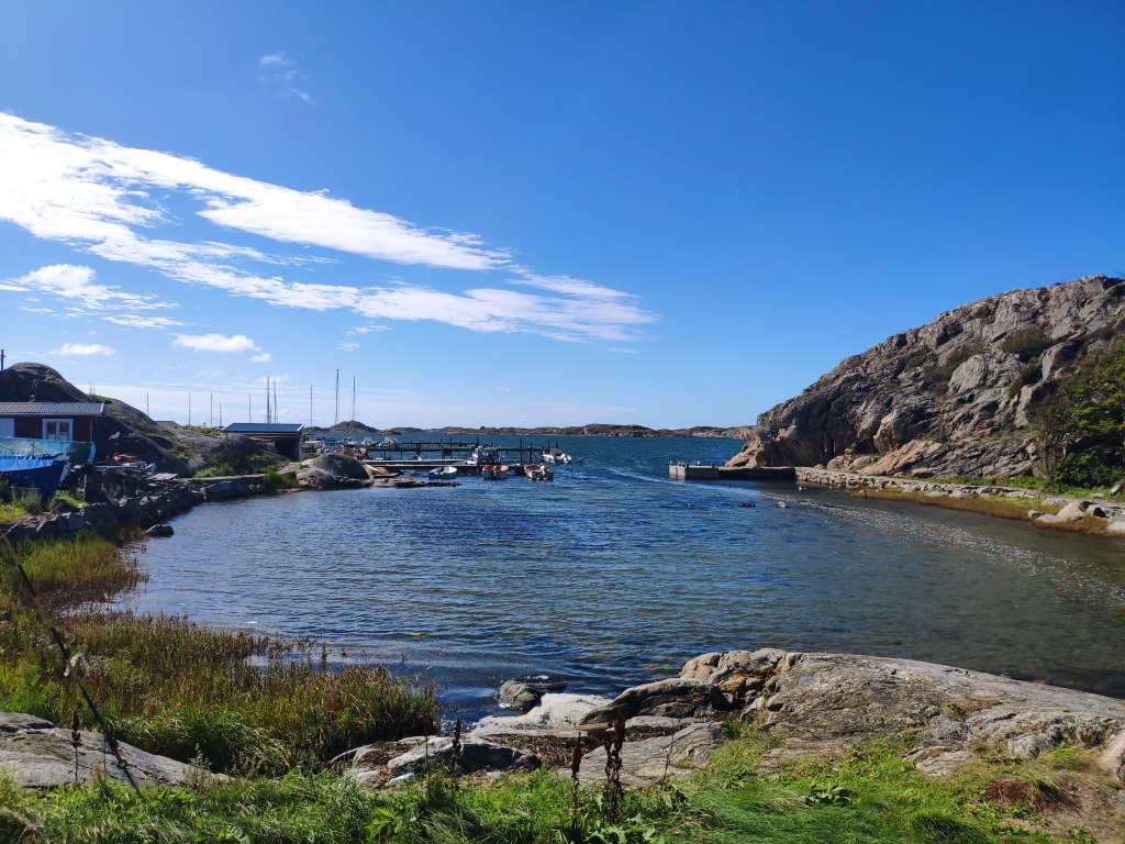 Blue sea and sky and boats from one of the islands of the Southern Archipelago
