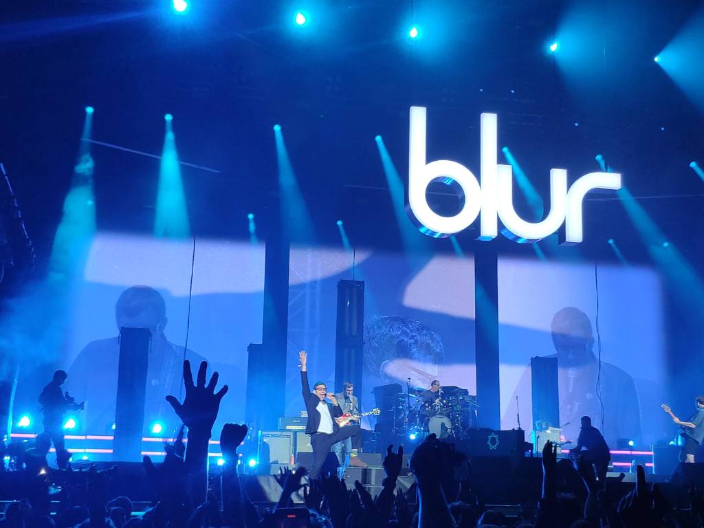 Blur performing on stage at the festival