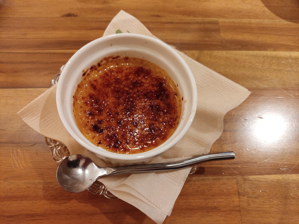 A small creme brulee with a nicely caramelised top