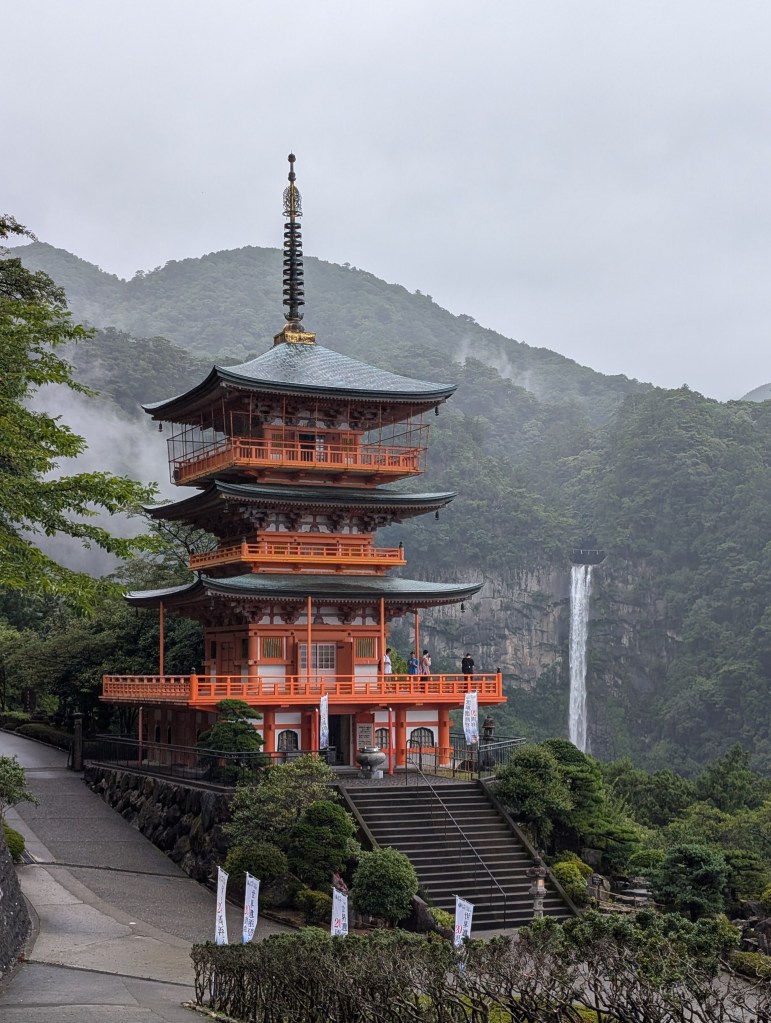 A pagoda at Nachi with a waterfall in the background