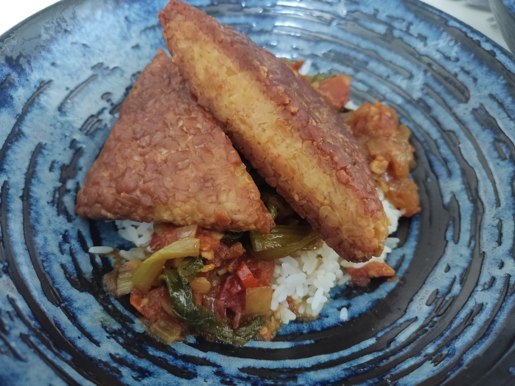 Tempeh with pak choi and tomato sambal
