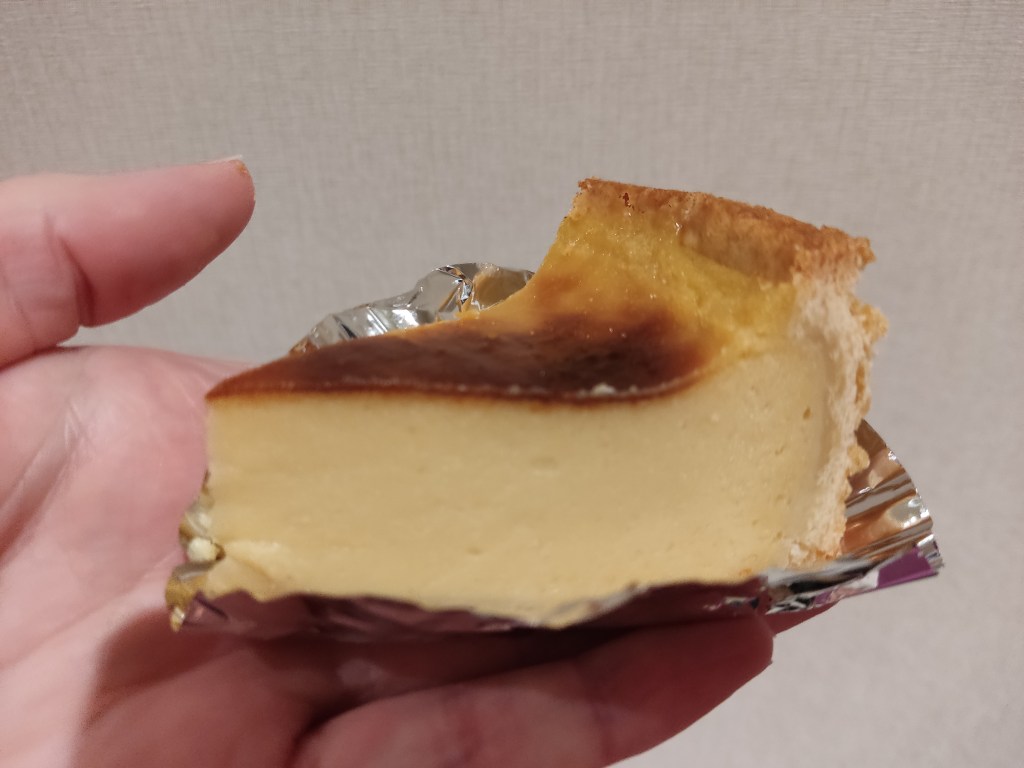 A tart with a thin pastry side, yellow cream, and caramelised top