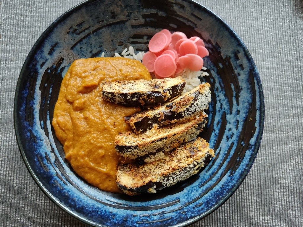 Aubergine katsu curry with pickled radishes