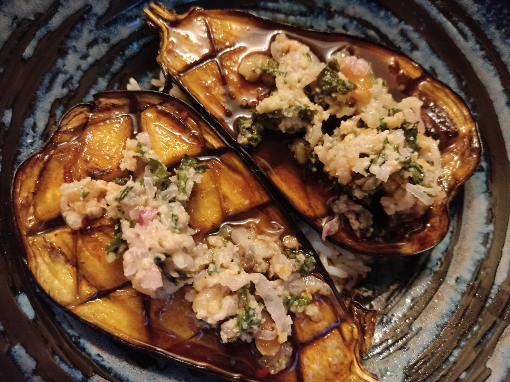 Aubergine larb with sticky rice and a shallot and peanut salad