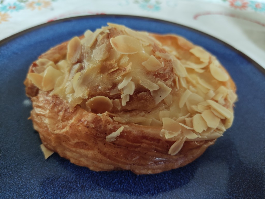 A cinnamon snail with a creamy icing on top