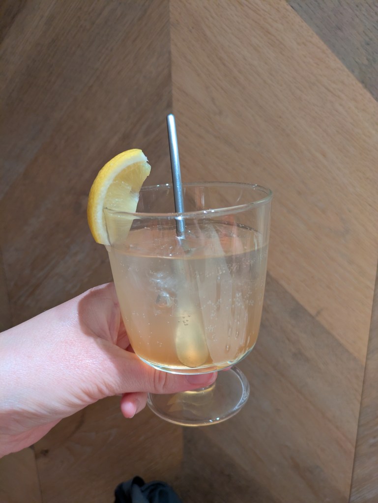 A small glass of ginger ale