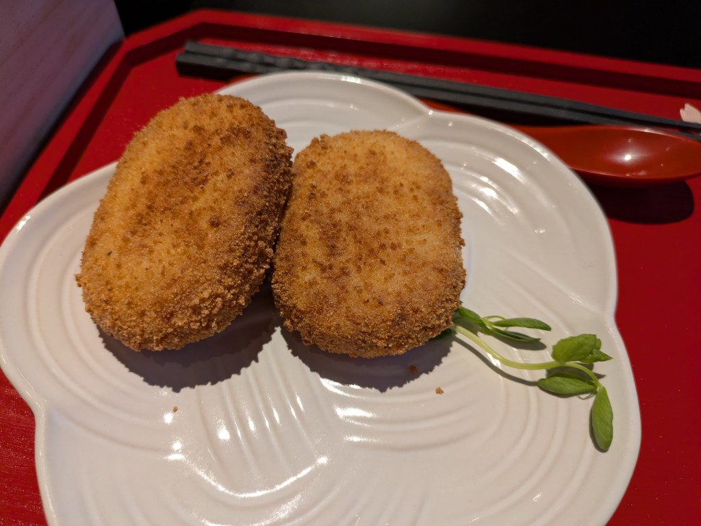 Two crispy looking croquettes
