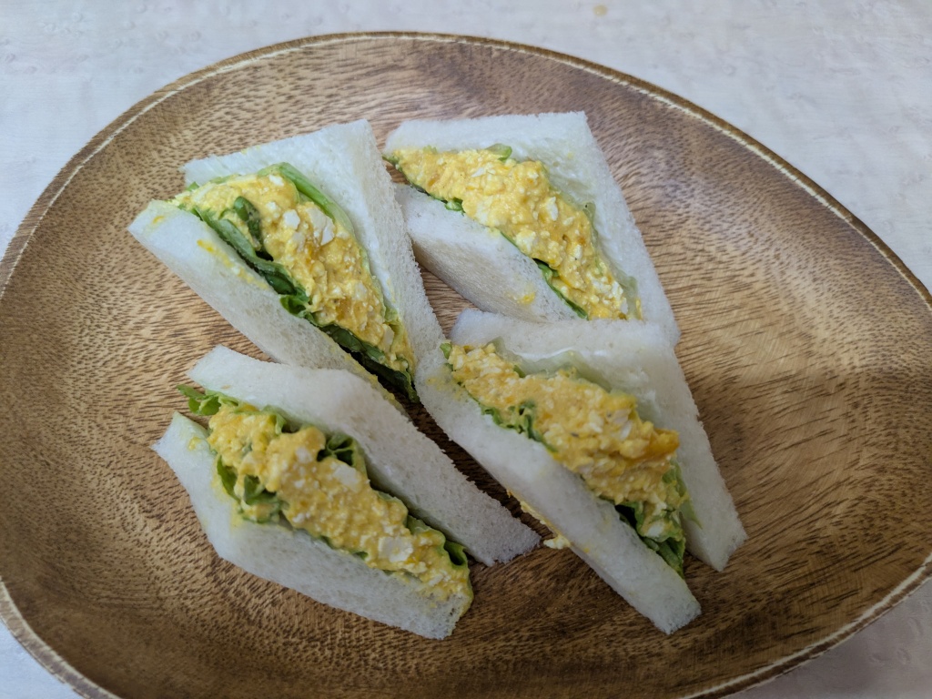 Egg sandwiches on white bread cut into triangles
