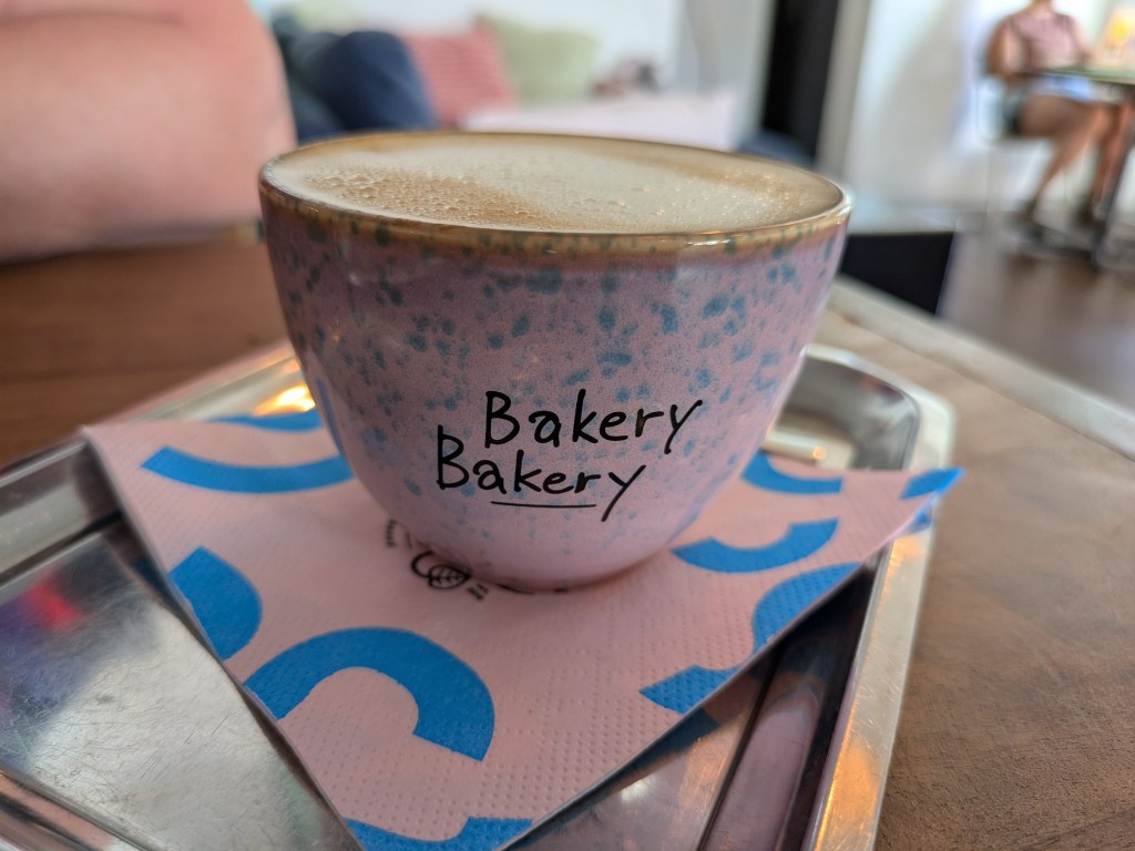 A coffee cup with Bakery Bakery written on it
