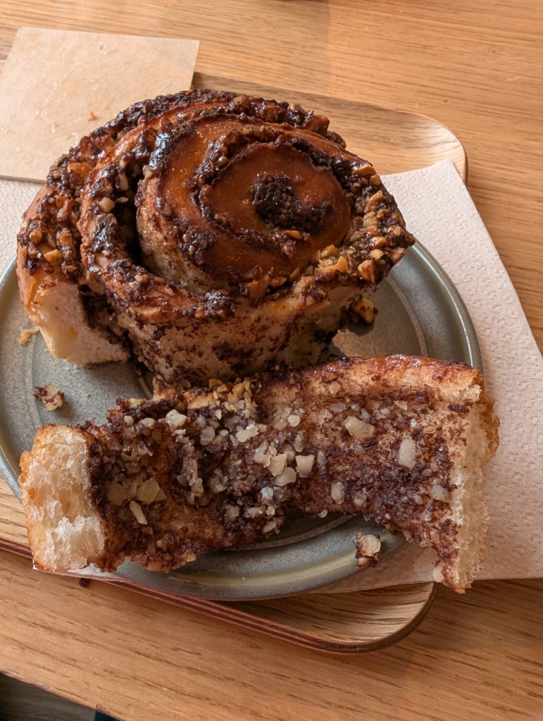 The inside of the babka roll with nuts running through the swirls 