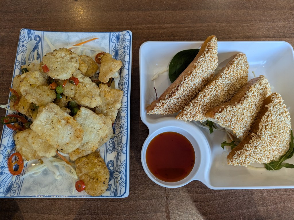 A plate of battered mushrooms and a plate of sesame toast