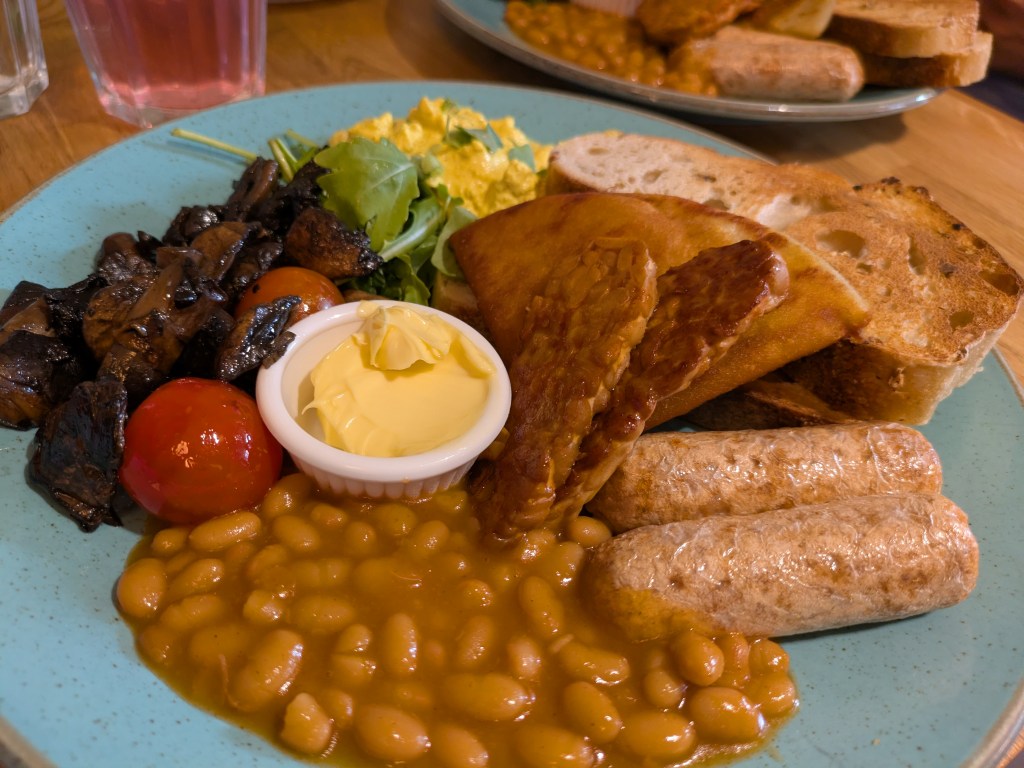 A big plate with a full cooked breakfast