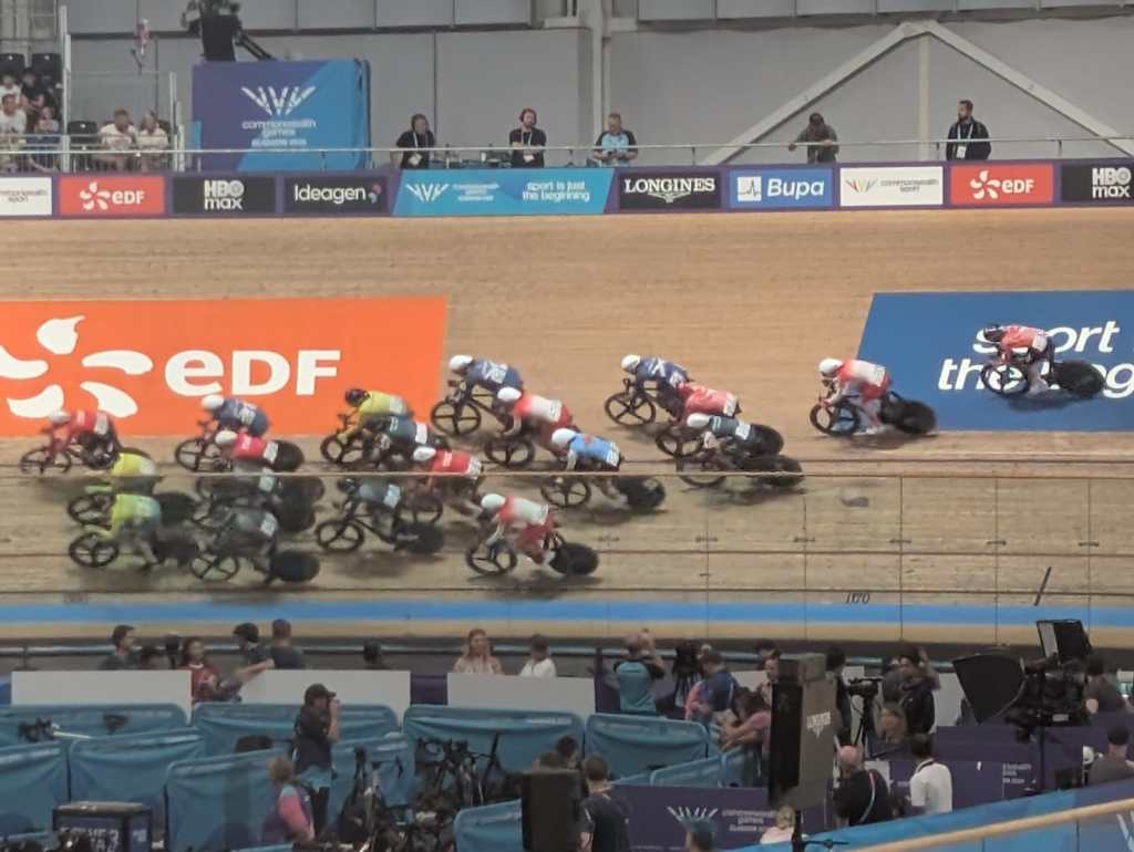 Cyclists racing around the velodrome